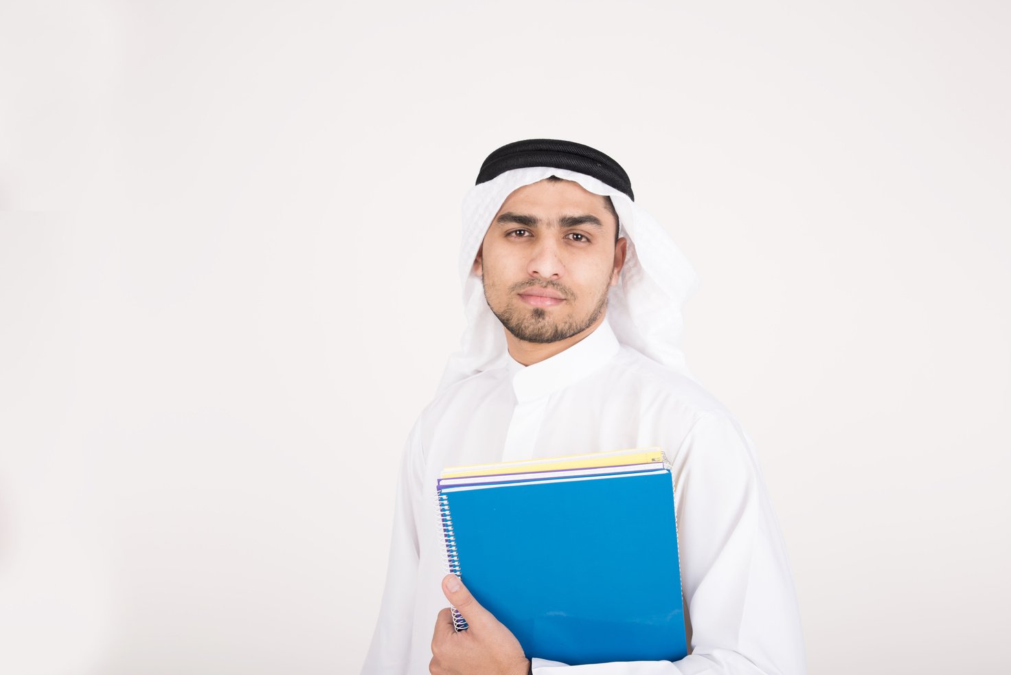 Arab muslim male student in traditional dress