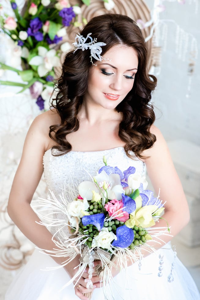 lovely shy girl in a wedding dres